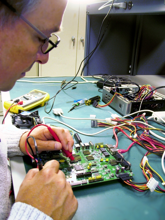 Engineer working on a circuit board